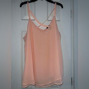 Peach colored flow tank top from torrid size 3X